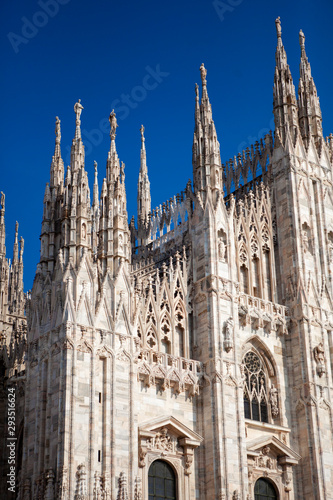 Duomo Di Milano - Cathedral  catholic church  is one of the world s largest building in the country. Close-up view of  marble details and statues on the exterior building. Milan  Lombardy  Italy.