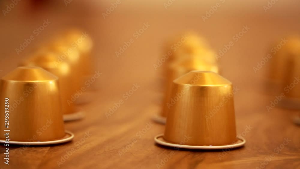 Closeup on a Nespresso volluto coffee capsules composition Closeup on a Nespresso volluto coffee capsules composition