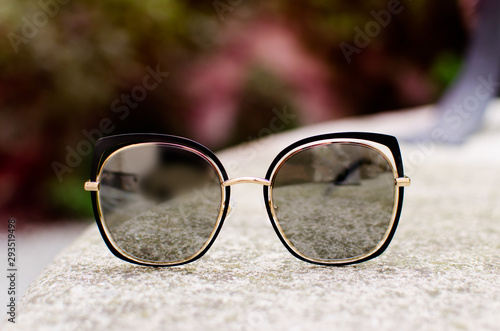 Close up with fashionable sunglasses outdoor