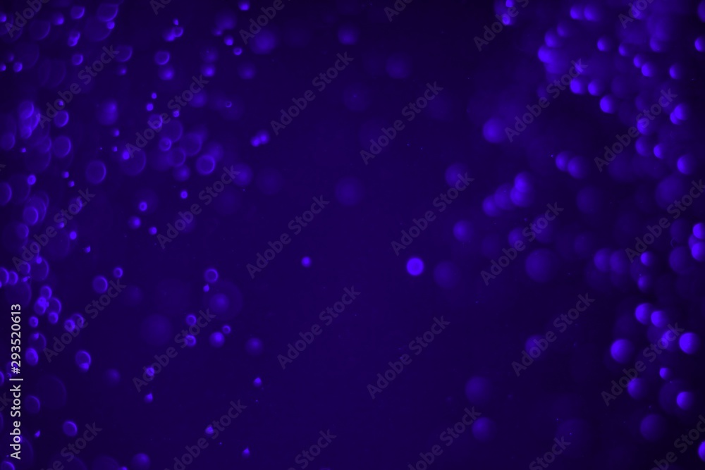 purple huge amount flying multi colored glitters bokeh texture - cute abstract photo background