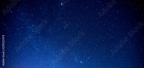 Panorama Sky and Stars, Long exposure photograph, with grain and select white balance.Night sky.