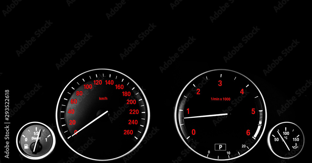 Car interior dashboard details with indication lamps. Car detailing. Car instrument panel. Dashboard closeup with visible speedometer and fuel level. Odometer, tachometer. Diesel engine. Car detailing
