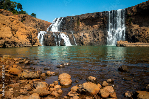 Se Pong Lai waterfall in summer. The most famous lao waterfall.Sae Pong Waterfall flows in the Xe-Pian River in the south of Laos after the Xe-Pian Xe Dam Later in southern Laos ASIA