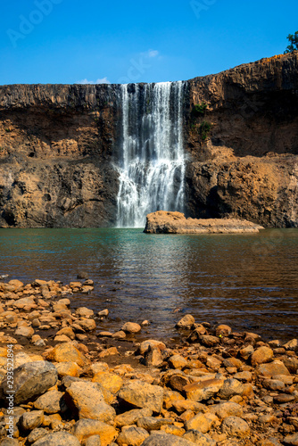 Se Pong Lai waterfall in summer. The most famous lao waterfall.Sae Pong Waterfall flows in the Xe-Pian River in the south of Laos after the Xe-Pian Xe Dam Later in southern Laos ASIA