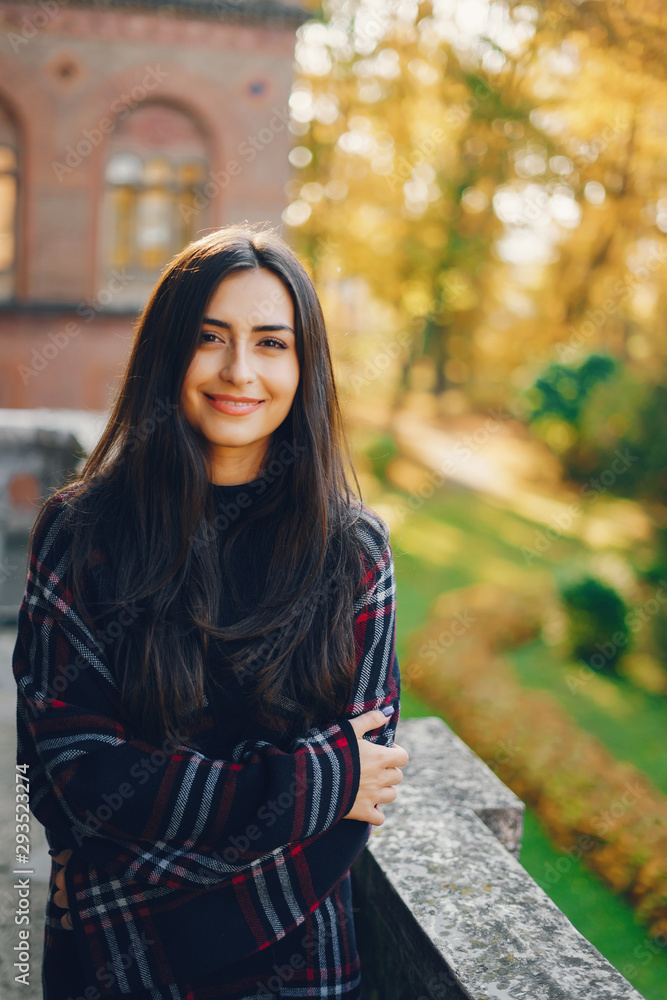 stylish girl exploring the city and park in the autumn stylish girl exploring the city and park in the autumn