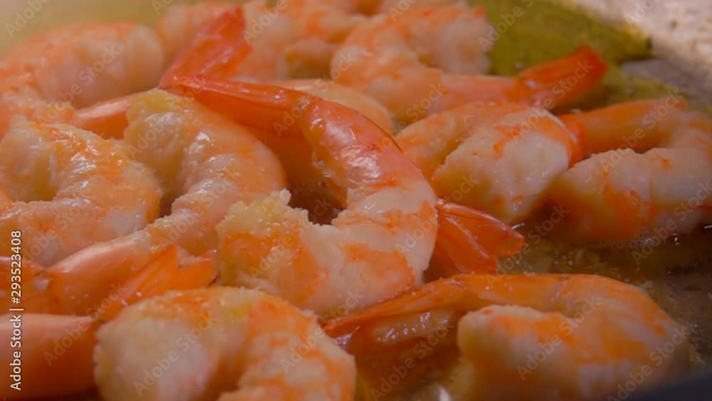Delicious shrimps fried in olive oil in a pan. Shrimp Recipe Delicious shrimps fried in olive oil in a pan. Shrimp Recipe