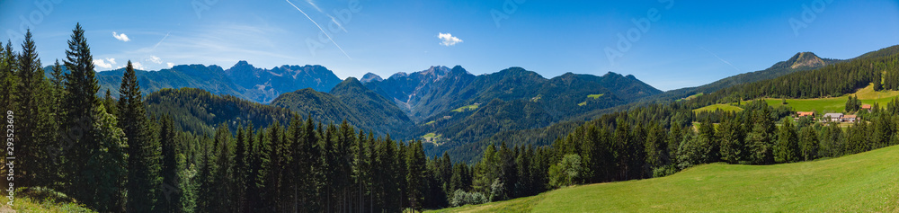 Sunny summer landscape with Solcava panoramic road, Logarska Dolina, Logar valley in Slovenia.