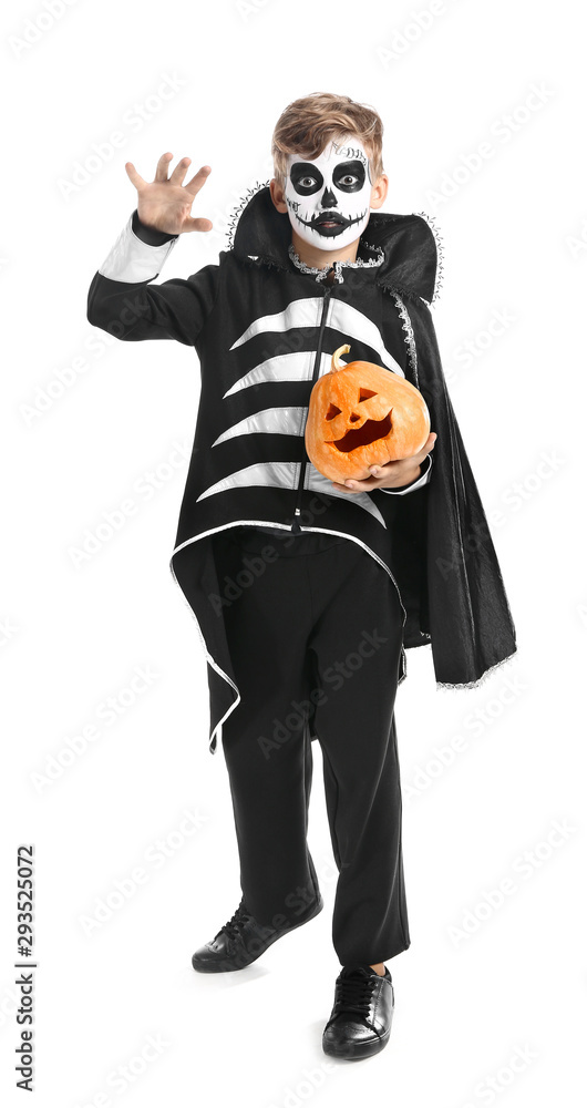 Little boy in Halloween costume and pumpkin on white background Little boy in Halloween costume and pumpkin on white background