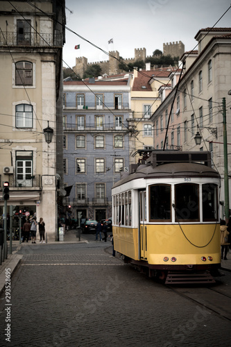 Public yellow tram in the old town, Lisbon, Portugal