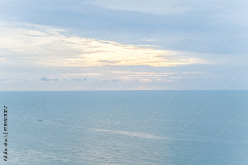 Morning sunrise sky with clouds in the sea