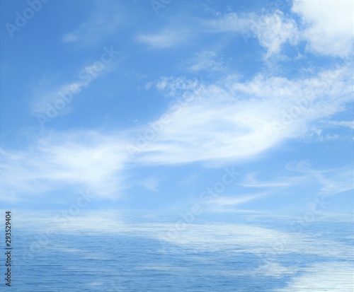 Sea clouds reflected in water