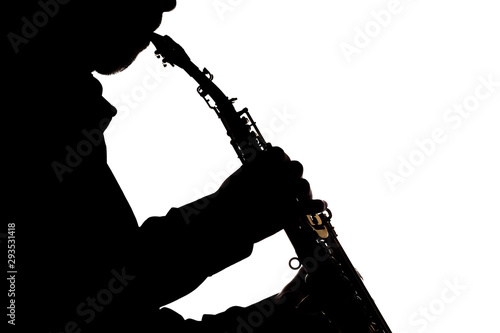 saxafon on a white background in the hands of a musician silhouette