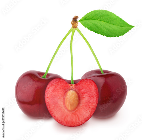 Whole and halved cherries isolated on a white.