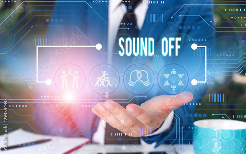 Text sign showing Sound Off. Business photo showcasing To not hear any kind of sensation produced by stimulation Male human wear formal work suit presenting presentation using smart device photo