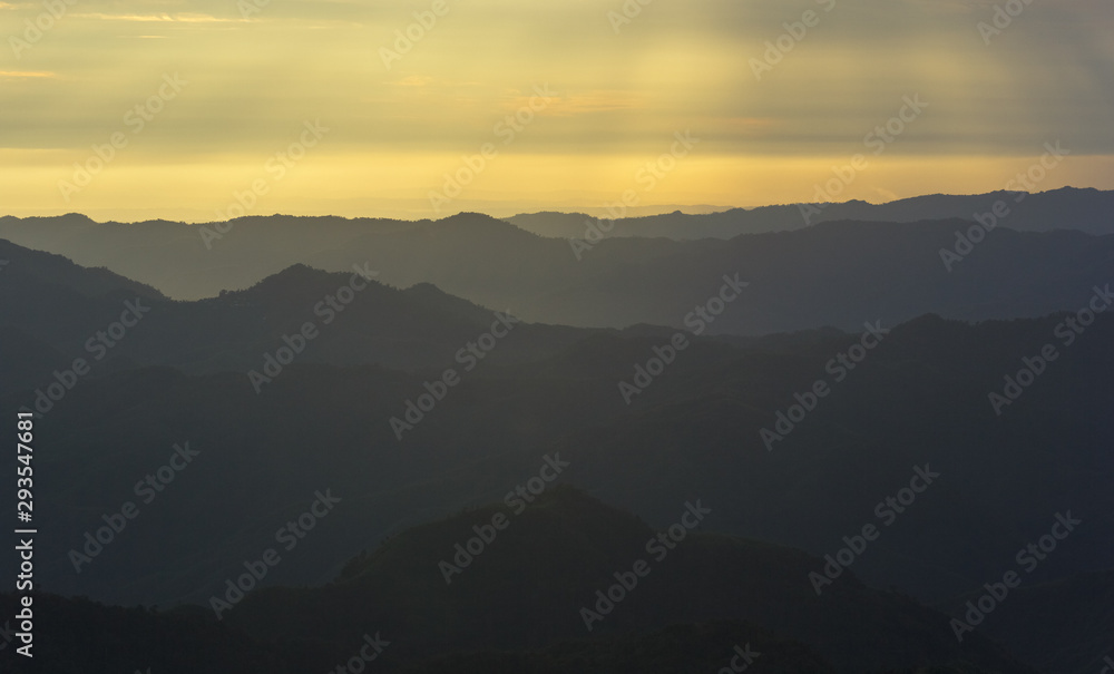 A view of sun rays hitting the hills of Mizoram from the village of Hmuifang.