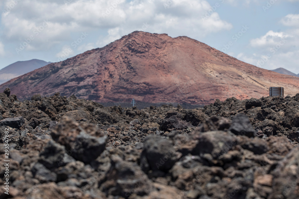 volcanic mountain with road signs in Lanzarote, Canary Island, Spain