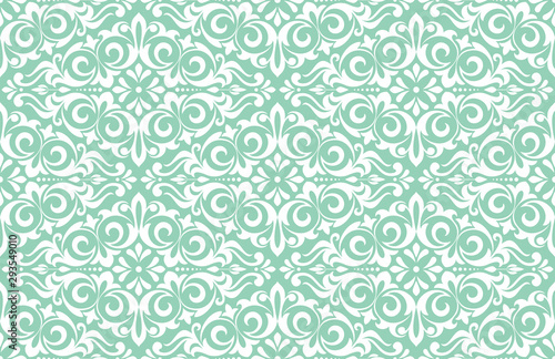 Wallpaper in the style of Baroque. Seamless vector background. White and green floral ornament. Graphic pattern for fabric, wallpaper, packaging. Ornate Damask flower ornament