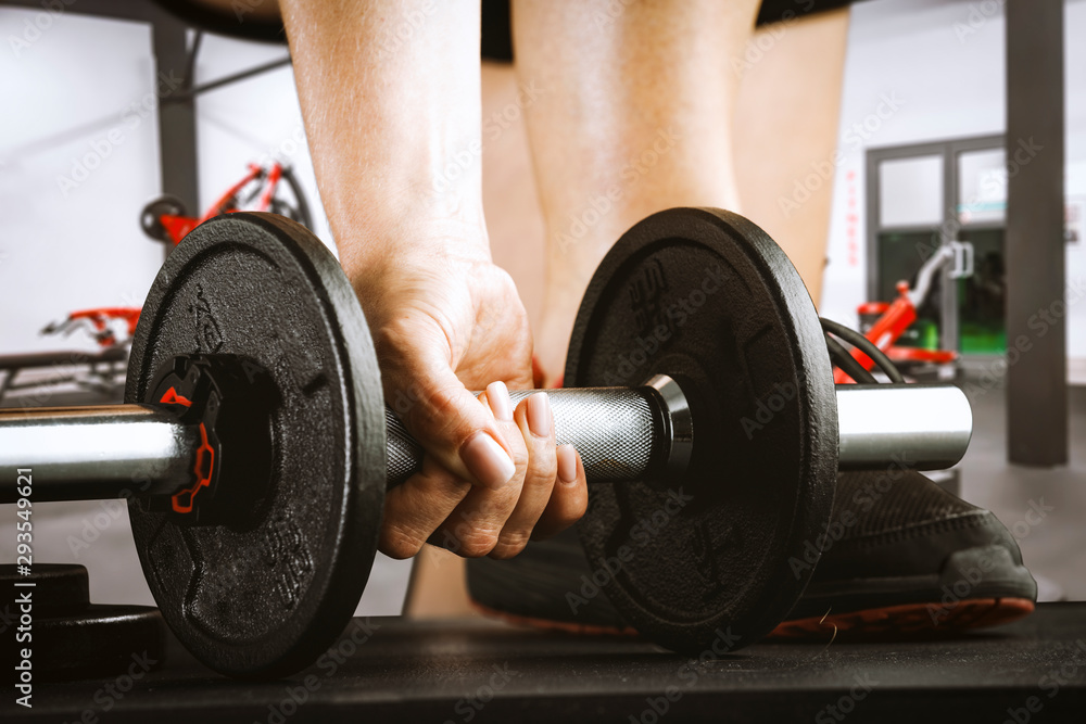 Gym interior and dumbbells on board with free space for your decoration. Gym interior and dumbbells on board with free space for your decoration.