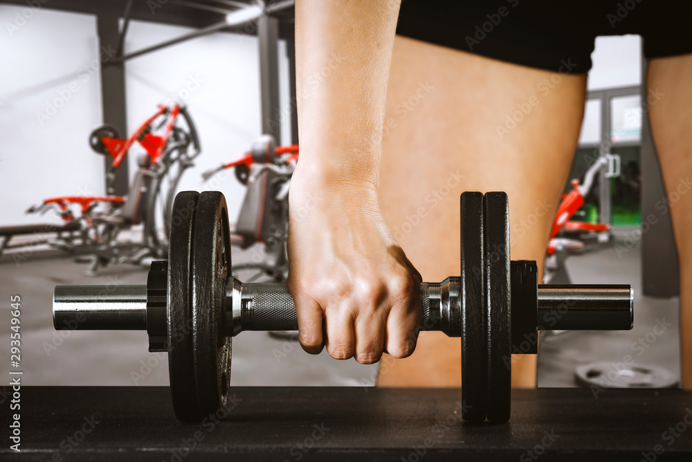 Gym interior and dumbbells on board with free space for your decoration. Gym interior and dumbbells on board with free space for your decoration.