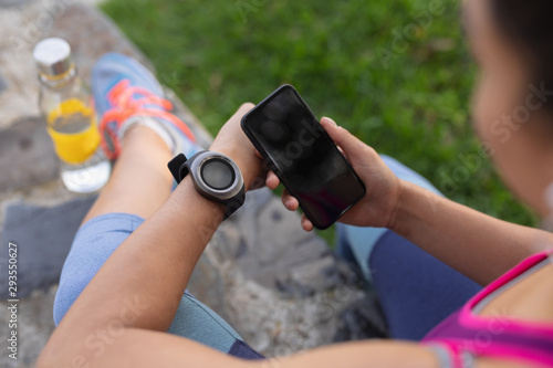 Woman exercising in a park photo