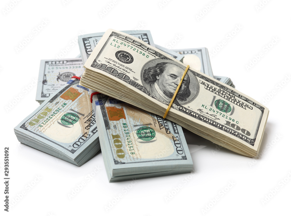 Many bundle of US 100 dollars bank notes isolated on white background Many bundle of US 100 dollars bank notes isolated on white background