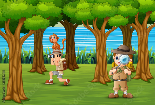 The scout boys exploring in forest