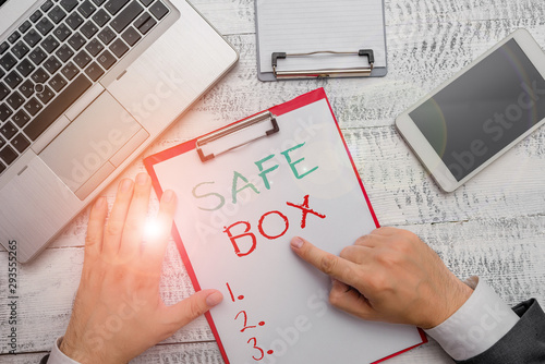 Conceptual hand writing showing Safe Box. Concept meaning A small structure where you can keep important or valuable things photo