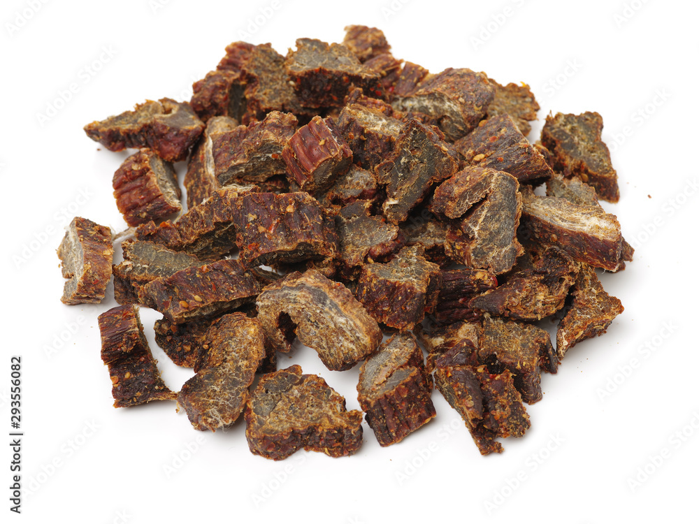 Slices of beef jerky on white background
