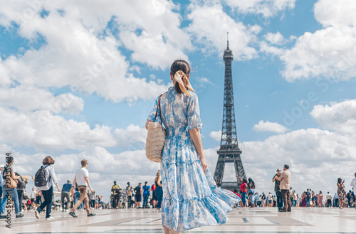 Attractive girl in a dress in Paris