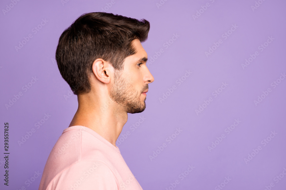 Fototapeta premium Close-up profile side view portrait of his he nice attractive calm content brunet bearded guy wearing pink tshirt isolated over violet purple lilac pastel color background