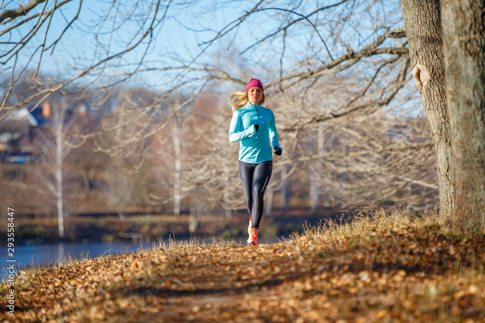 Fototapeta premium Fitness girl training running in the morning park