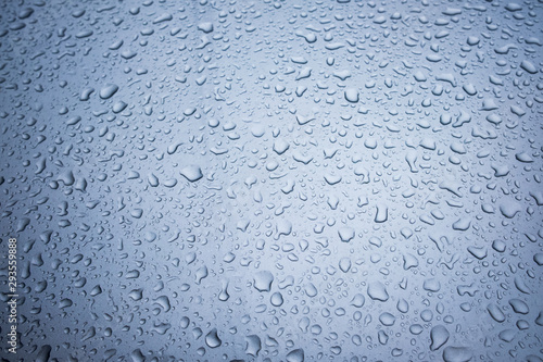 Water droplets on the surface of metal