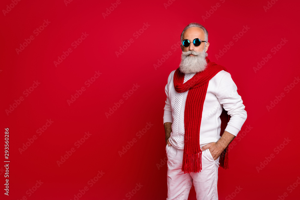 Portrait of his he nice attractive handsome content classy gray-haired man holding hands in pockets wearing pullover sweater isolated over bright vivid shine red background Portrait of his he nice attractive handsome content classy gray-haired man holding hands in pockets wearing pullover sweater isolated over bright vivid shine red background