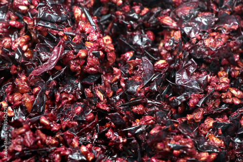 Pressed grape pomace, seeds and skins. Winemaking background. photo