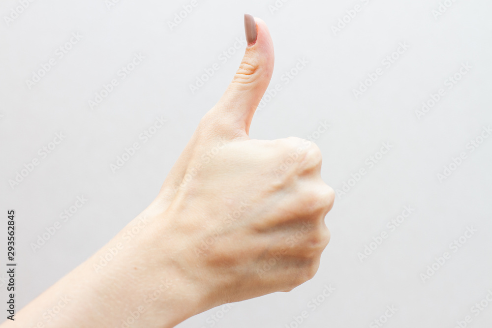 hand with thumb up isolated on white background hand with thumb up isolated on white background
