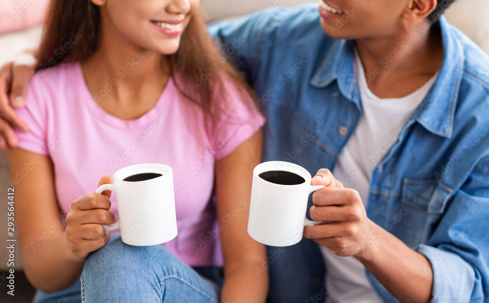 Couple enjoying tasty coffee on a date at home Couple enjoying tasty coffee on a date at home