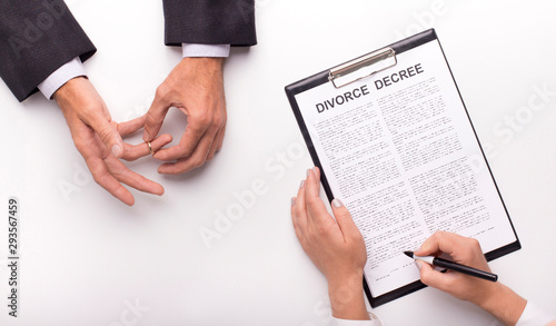 Lawyer draw up divorce decree on planner