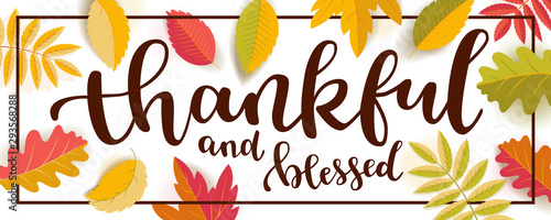 Thankful and blessed Thanksgiving quote horizontal banner.  Bright warm colors design with a frame. Flat colorful realistic autumn leaves with shadows isolated on white background. Vector illustration photo