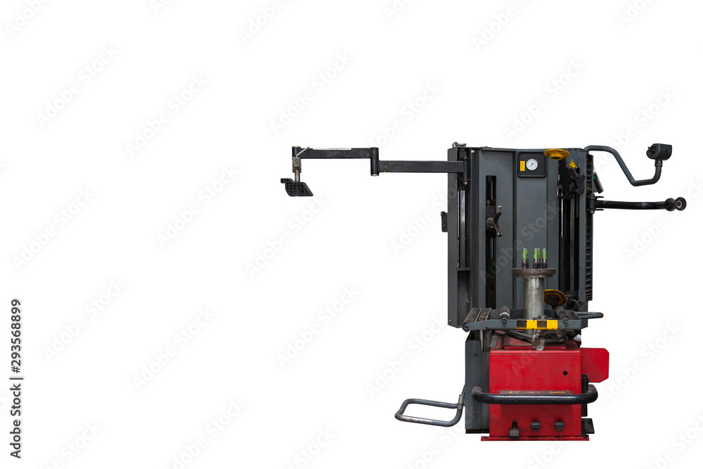 Fototapeta premium Tire changer for seasonal change of car tires and repair of punctures and cuts in a auto service on a white isolated background. Maintenance and repair of vehicles.