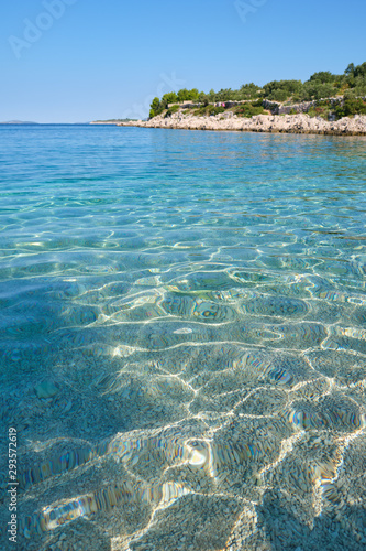 Fototapeta Naklejka Na Ścianę i Meble -  Crystal clear blue green Adriatic sea and a rocky beach on the island Krk, Croatia,