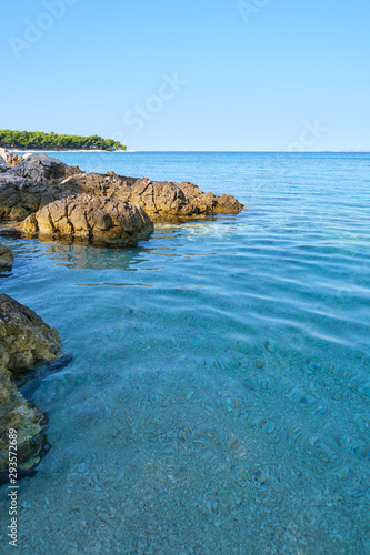 Fototapeta Naklejka Na Ścianę i Meble -  Crystal clear blue green Adriatic sea and a rocky beach on the island Krk, Croatia,