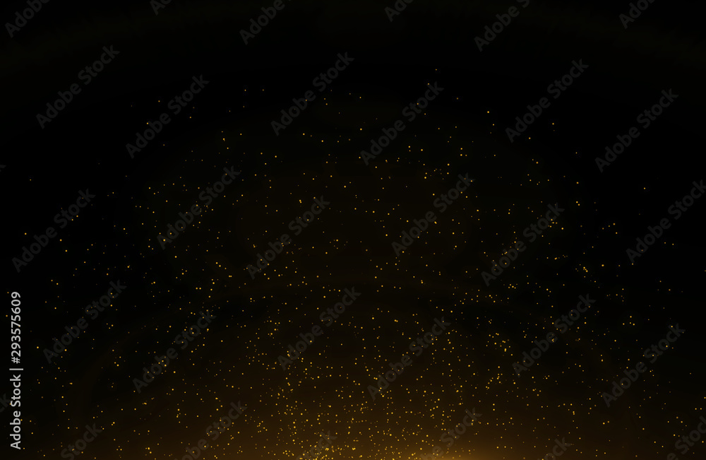 Abstract background of flickering gold particles and light flare