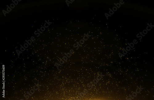Obraz na płótnie Abstract background of flickering gold particles and light flare w salonie