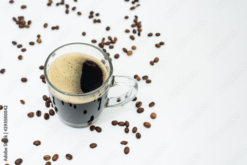 Fototapeta Cup of fresh coffee and coffee beans on white background . space for text. background image