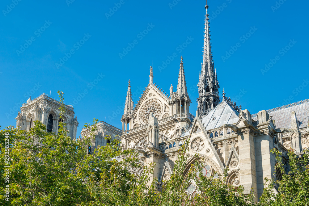 Notre Dame de Paris - famous cathedral with blue sky before fire April 15, 2019. Paris, France