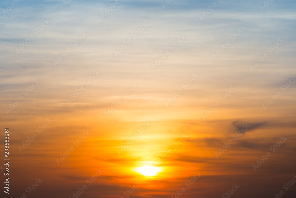 Beautiful sky and clouds with orange dramatic sunset. Can be used as abstract or nature background