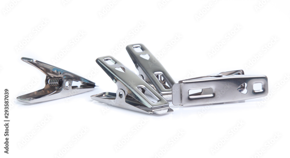 Peg steel, metal clothespin isolated on white background Peg steel, metal clothespin isolated on white background