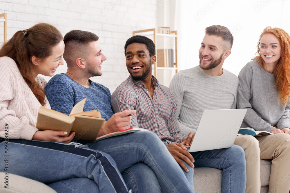 Group of multiethnic young students preparing for exams Group of multiethnic young students preparing for exams