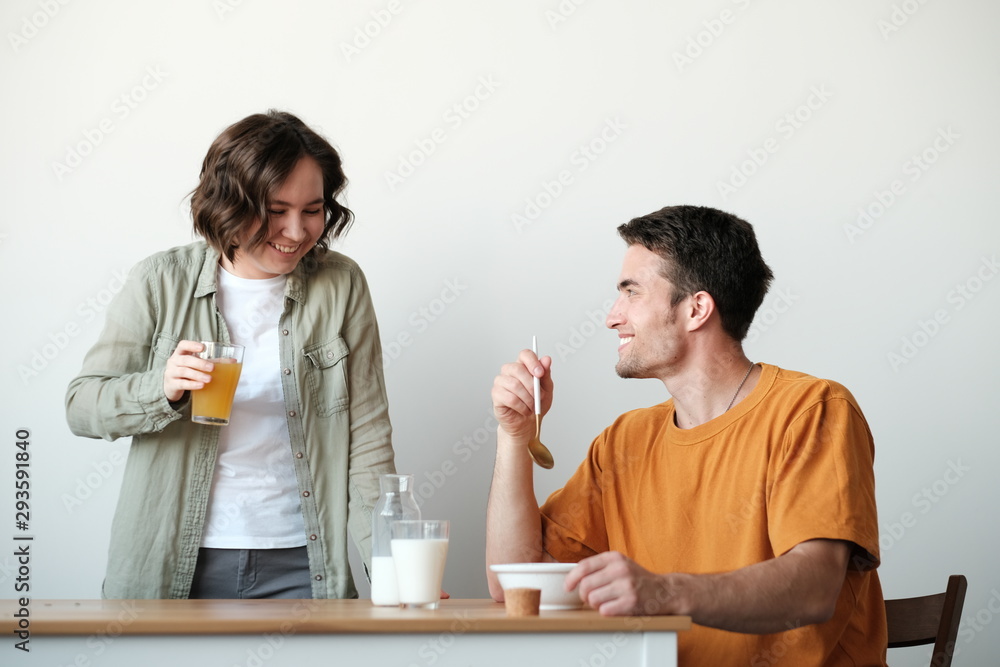 couple having breakfast in the morning at home couple having breakfast in the morning at home