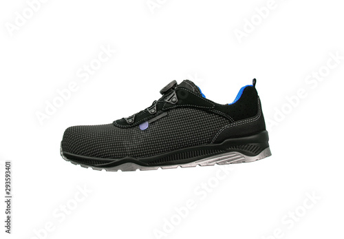 Modern black sneakers with blue accents. Sports shoes isolate on a white background.